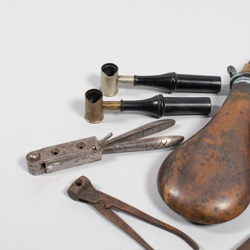 417J - A collection of 18th and 19th century gun-related tools, 2 powder flasks, 2 powder pourers, and 3 bu... 