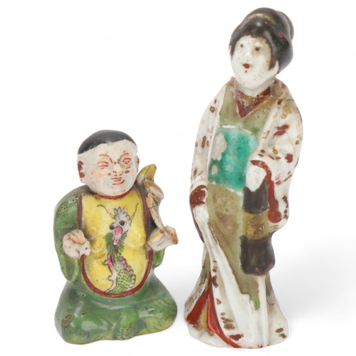 557 - Two oriental ceramic figures with polychrome enamel decoration, smaller figure with Sotheby's label ... 