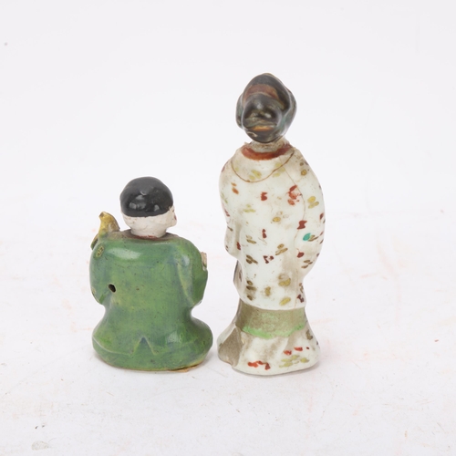 557 - Two oriental ceramic figures with polychrome enamel decoration, smaller figure with Sotheby's label ... 