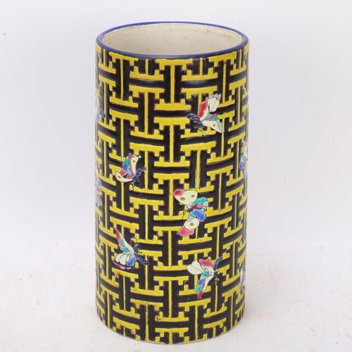 559 - A late 19th century Longwy cylinder vase, with Japonoiserie decoration woman and butterflies to reve... 