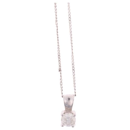 1298 - A modern 9ct white gold 0.25ct single stone diamond pendant necklace, on 9ct white gold fine curb li... 