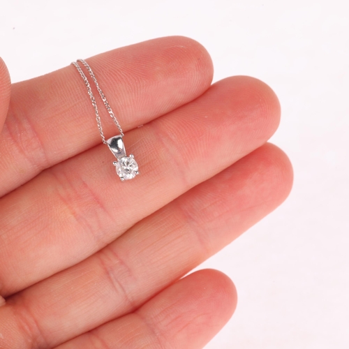 1298 - A modern 9ct white gold 0.25ct single stone diamond pendant necklace, on 9ct white gold fine curb li... 