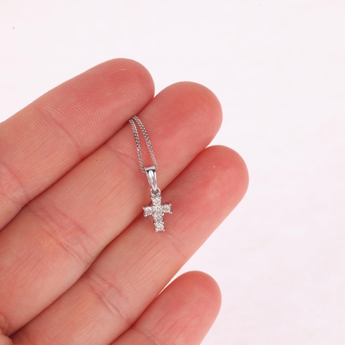 1300 - A modern 9ct white gold diamond cross pendant necklace, on  9ct white gold fine curb link chain, pen... 