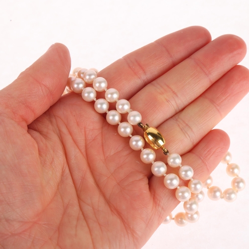 1306 - A single-row cultured pearl bead necklace, with 9ct gold barrel clasp, set with 6.1mm pearl, 48cm, 2... 