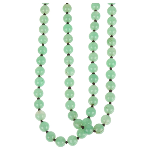 1307 - A single-row polished jadeite bead necklace, set with 12.2mm beads, 140cm, 242.8g