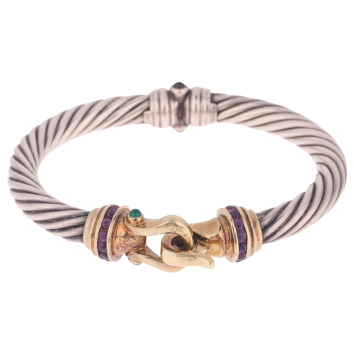 1322 - DAVID YURMAN (NEW YORK) - an American sterling silver and 14ct gold gem set hinged bangle, the twist... 