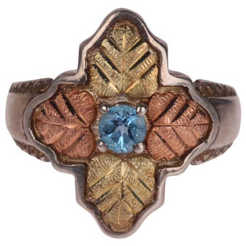 1331 - A sterling silver and 12k two-colour gold blue topaz 'Black Hills' leaf ring, setting height 19.5mm,... 