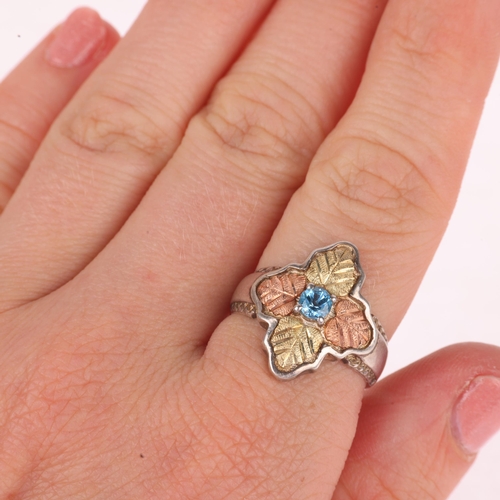 1331 - A sterling silver and 12k two-colour gold blue topaz 'Black Hills' leaf ring, setting height 19.5mm,... 