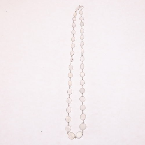 1332 - A sterling silver moonstone Riviere necklace, set with round and oval cabochon moonstones, 52cm, 24.... 