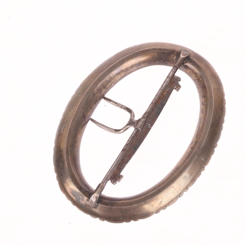 1335 - A Georgian silver and paste oval shoe buckle, with central steel fitting, 75.4mm, 35.8g