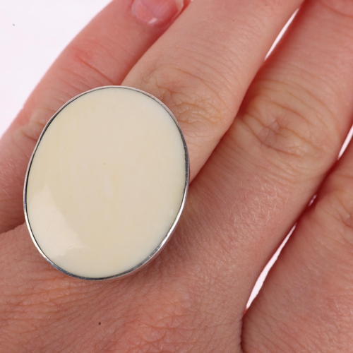 1365 - CORONA JEWELLERY - a Danish modernist sterling silver marine ivory panel ring, setting height 30.1mm... 