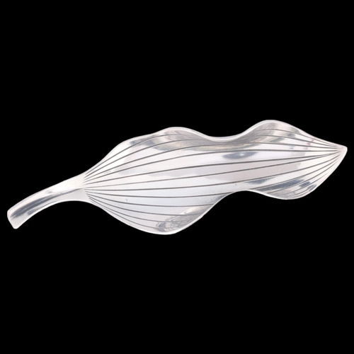 1370 - ANTON MICHELSEN - a Danish modernist sterling silver leaf brooch, designed by Gertrude Engel Rougie,... 