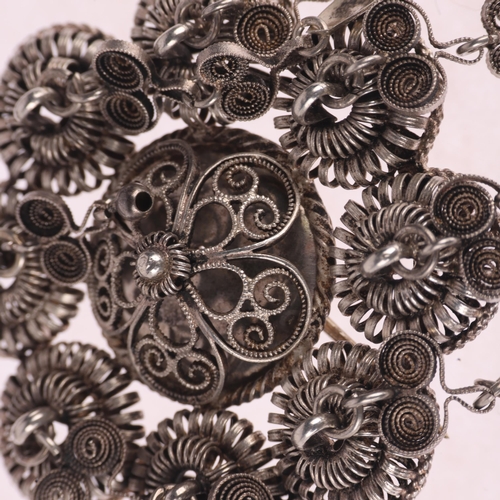 1388 - A Norwegian silver Folk Art bombe brooch, with filigree flowerhead drops, 67mm, 18.1g