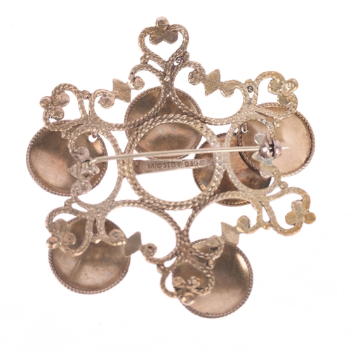 1391 - M OSTBY - a Norwegian silver-gilt Folk Art brooch, with filigree disc drops, 64.4mm, 16.3g