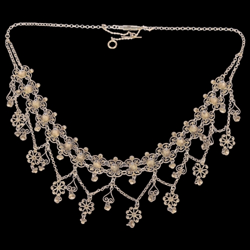 1393 - A Norwegian silver Folk Art festoon necklace, with filigree wirework and cannetille decoration, 38cm... 