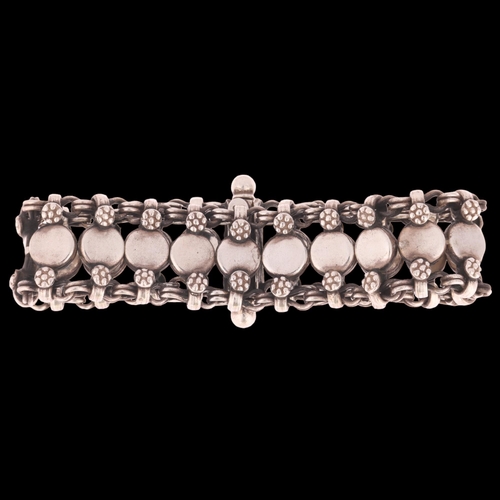 1394 - RICHARG AABOE - a Danish sterling silver flowerhead panel bracelet, 18cm, 65.2g