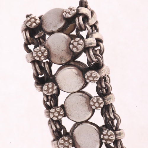 1394 - RICHARG AABOE - a Danish sterling silver flowerhead panel bracelet, 18cm, 65.2g