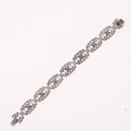 1397 - HORSENS SOLVVAREFABRIK - an Art Deco style Danish silver openwork panel bracelet, 19cm, 25.7g