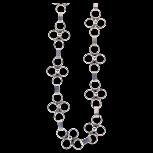 1399 - ERIK LOUIS ARVIG - a Danish stylised silver flowerhead panel necklace, 39cm, 19g