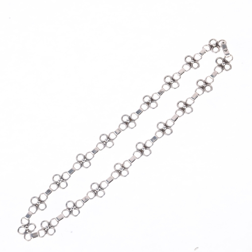 1399 - ERIK LOUIS ARVIG - a Danish stylised silver flowerhead panel necklace, 39cm, 19g