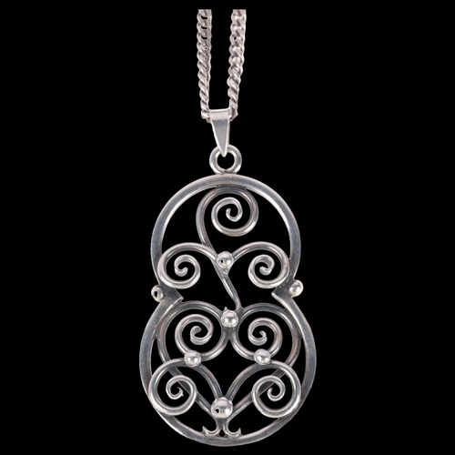 1401 - An Art Nouveau style Swedish silver openwork pendant necklace, on sterling flat curb link chain, pen... 