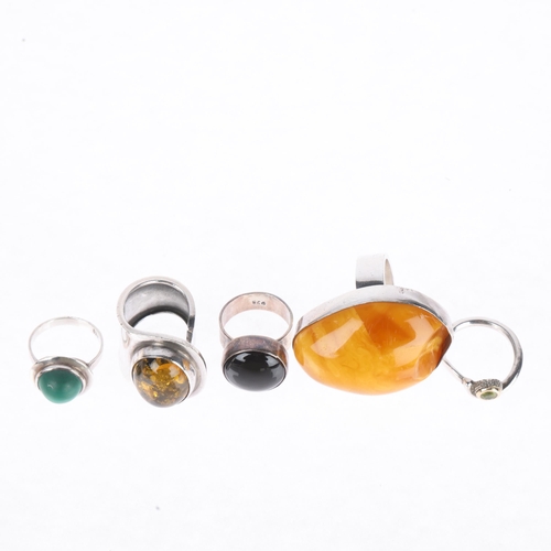 1430 - 5 Continental silver rings, including amber, 49.7g total (5)