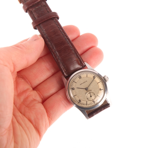 1013 - ARCADIA - a Vintage stainless steel mechanical wristwatch, circa 1950s, silvered dial with black eig... 