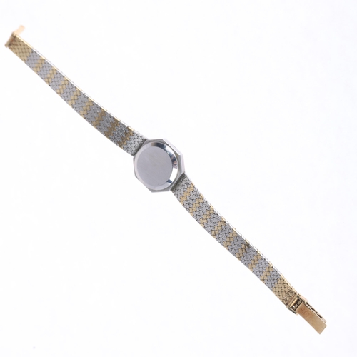 1021 - OMEGA - a lady's bi-metal quartz bracelet watch, ref. 591.0011, silvered dial with applied gilt bato... 