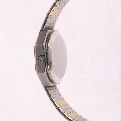 1021 - OMEGA - a lady's bi-metal quartz bracelet watch, ref. 591.0011, silvered dial with applied gilt bato... 