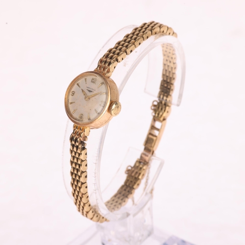 1023 - LONGINES - a lady's Vintage 9ct gold mechanical bracelet watch, circa 1960s, silvered dial with appl... 