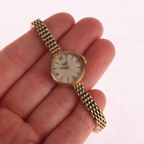 1023 - LONGINES - a lady's Vintage 9ct gold mechanical bracelet watch, circa 1960s, silvered dial with appl... 