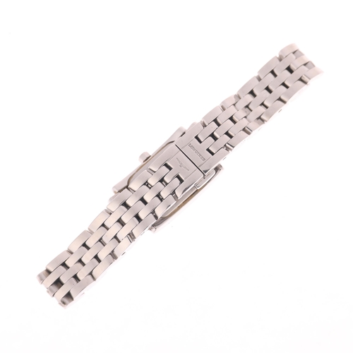 1024 - LONGINES - a lady's stainless steel DolceVita quartz bracelet watch, ref. L5.158.4, white mother-of-... 