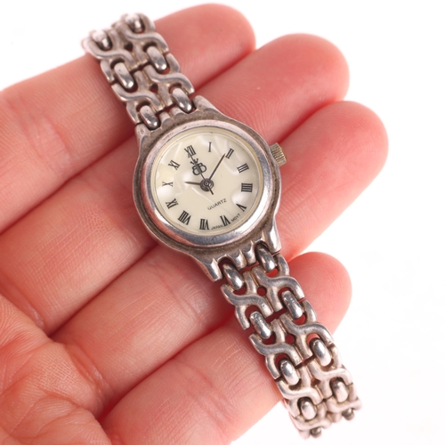 1028 - A lady's sterling silver quartz bracelet watch, cream dial with Roman numeral hour markers, pencil h... 