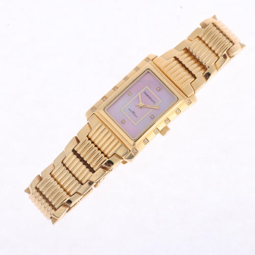 1035 - DIAMOND & CO - a lady's gold plated stainless steel quartz bracelet watch, ref. DC012, pink mother-o... 