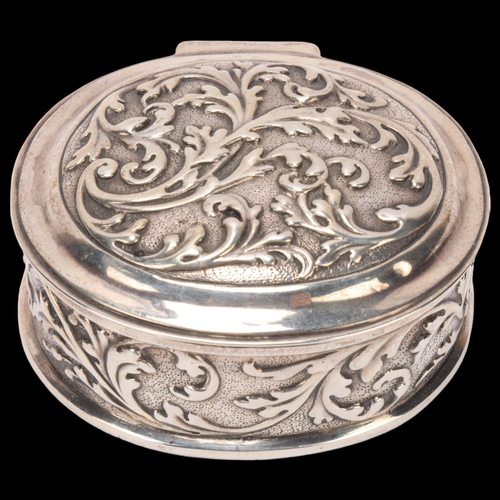 1452 - A German silver dressing table box, imported by Berthold Muller, London 1910, oval form with relief ... 