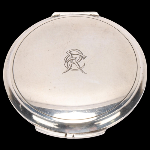 1453 - GEORG JENSEN - a Danish sterling silver powder compact, model no. 231M, circular form with internal ... 