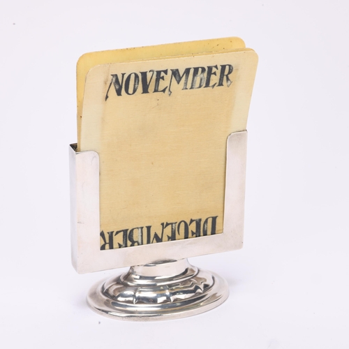 1462 - An Art Deco George V silver desk perpetual calendar, A&J Zimmerman, Birmingham 1912, with ivorine sh... 