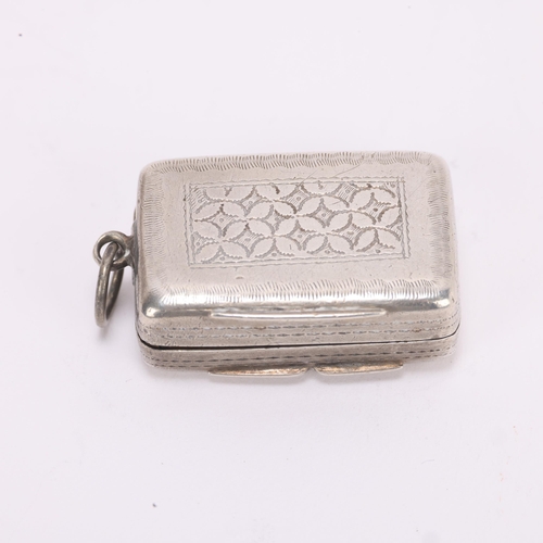 1472 - A William IV silver vinaigrette, maker TS, Birmingham 1834, rectangular form with bright-cut engrave... 