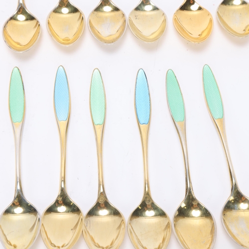 1493 - FRIGAST - a set of 12 Danish vermeil sterling silver and harlequin enamel coffee spoons, 9.5cm