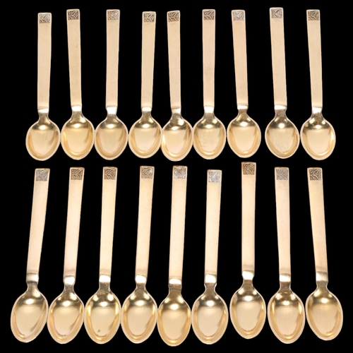 1495 - EVALD J NIELSEN - a set of 18 Danish modernist silver-gilt coffee spoons, 9.5cm, 5.6oz total