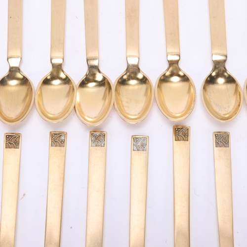 1495 - EVALD J NIELSEN - a set of 18 Danish modernist silver-gilt coffee spoons, 9.5cm, 5.6oz total