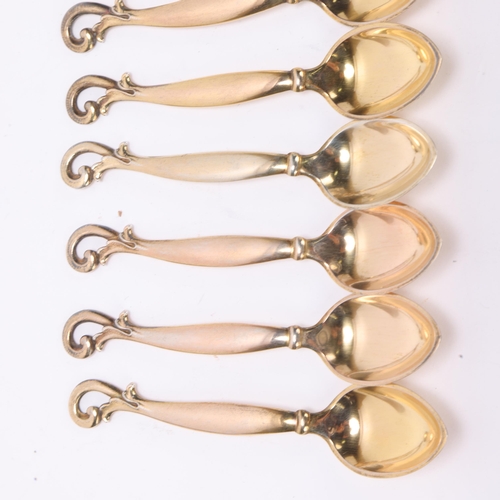 1496 - HORSENS SOLVVAREFABRIK - a set of 7 Art Nouveau Danish silver-gilt coffee spoons, 9cm