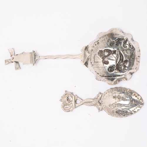 1498 - 2 Antique Continental silver spoons, comprising larger novelty serving spoon with windmill terminal,... 