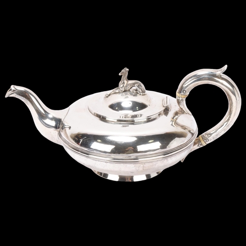 1523 - A William IV silver teapot, Charles Gordon, London 1832, circular squat form with cast-silver Greyho... 