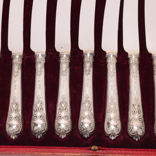 1528 - A cased set of 12 George V silver-handled dessert knives, Thomas Bradbury & Sons Ltd, Sheffield 1910... 