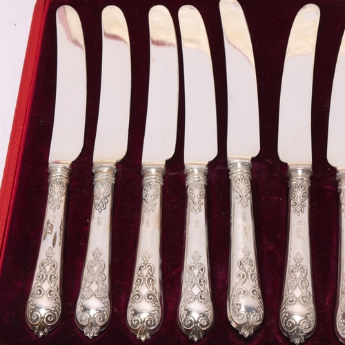 1528 - A cased set of 12 George V silver-handled dessert knives, Thomas Bradbury & Sons Ltd, Sheffield 1910... 