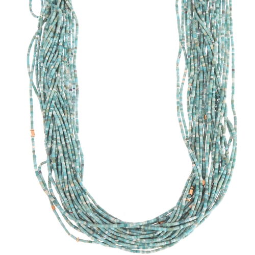 1101 - **WITHDRAWN** A Middle Eastern 22ct gold multi-strand turquoise bead torsade necklace, with gold spa... 