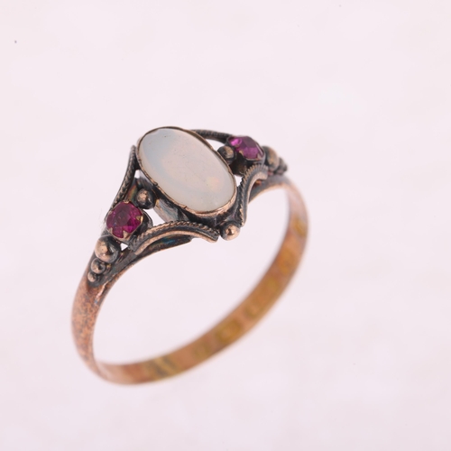 1108 - A Victorian 15ct gold three stone opal and ruby ring, maker JP, Birmingham 1874, rub-over set with o... 