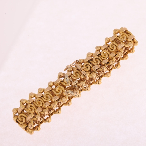 1121 - A Continental 21ct gold fancy link chain bracelet, indistinct assay marks on clasp, 18cm, 26.6g