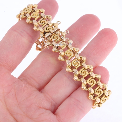 1121 - A Continental 21ct gold fancy link chain bracelet, indistinct assay marks on clasp, 18cm, 26.6g